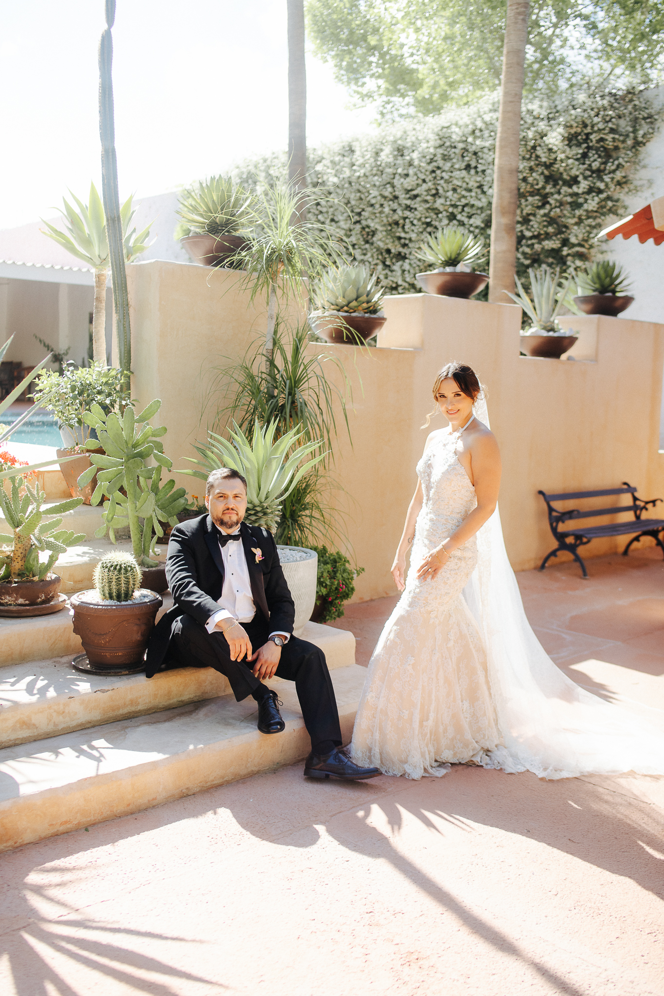 Kenya and Alfonso laughing together — candid wedding photography by David Tovar